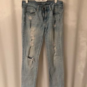 American Eagle distressed light wash skinny jeans